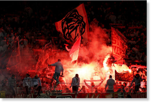 FC Köln fans light flares during the match