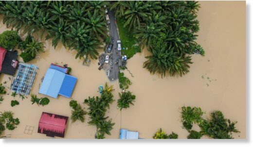 An aerial view shows the extent of flooding in the town of Yong Peng, located in Malaysia's southern Johor state on 4 March, 2023.