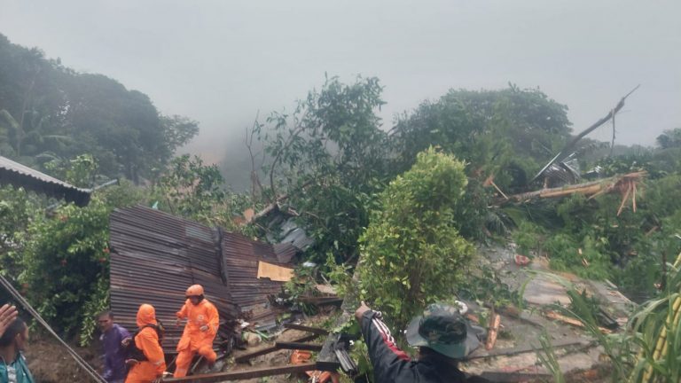 Click to enlarge Landslide damage in Serasan District,