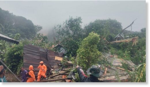 Click to enlarge Landslide damage in Serasan District,