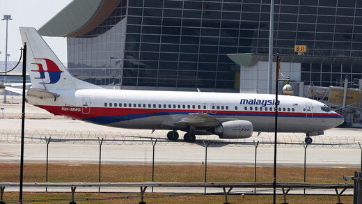 Click to enlarge Malaysia Airline passenger jet parked on the tarmac at the Kuala Lumpur International Airport on March 8, 2014