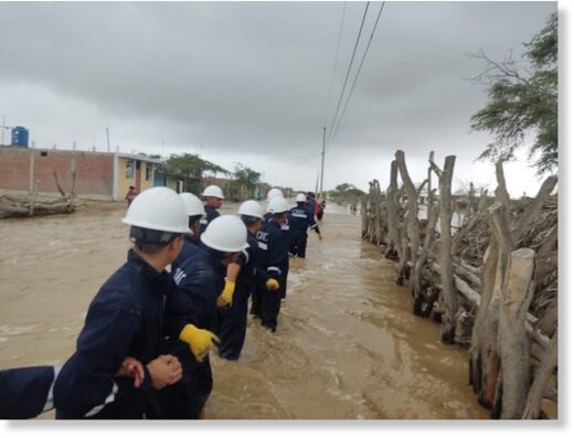 Click to enlarge Military assist with evacuations after floods in Lambayeque Department, Peru, 09 March 2023.