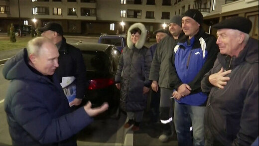 Russian President Vladimir Putin meets locals in the city of Mariupol.