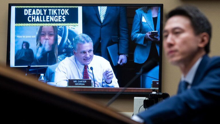 Click to enlarge Rep. Buddy Carter, R-Ga., questions TikTok CEO Shou Zi Chew
