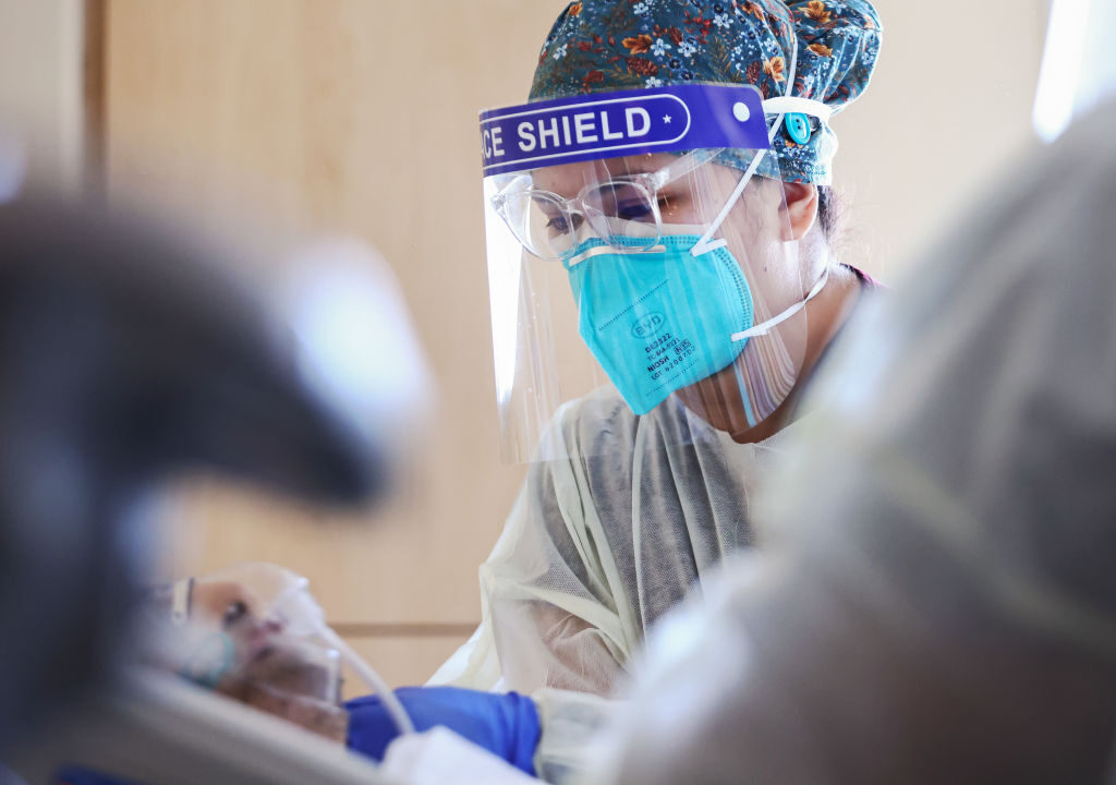Click to enlarge COVID nurse