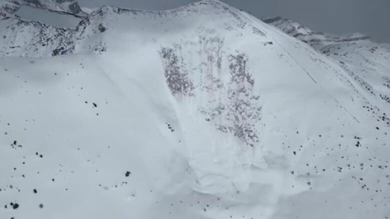 An image shows the aftermath of an avalanche Saturday, April 22, 2023, in Lake Louise Ski Resort's West Bowl area.