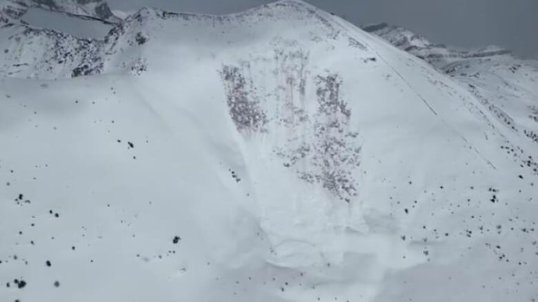 Click to enlarge An image shows the aftermath of an avalanche Saturday, April 22, 2023, in Lake Louise Ski Resort's West Bowl area.