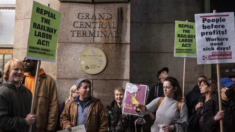 rights groups protest, to demand sick pay and union rights for rail workers