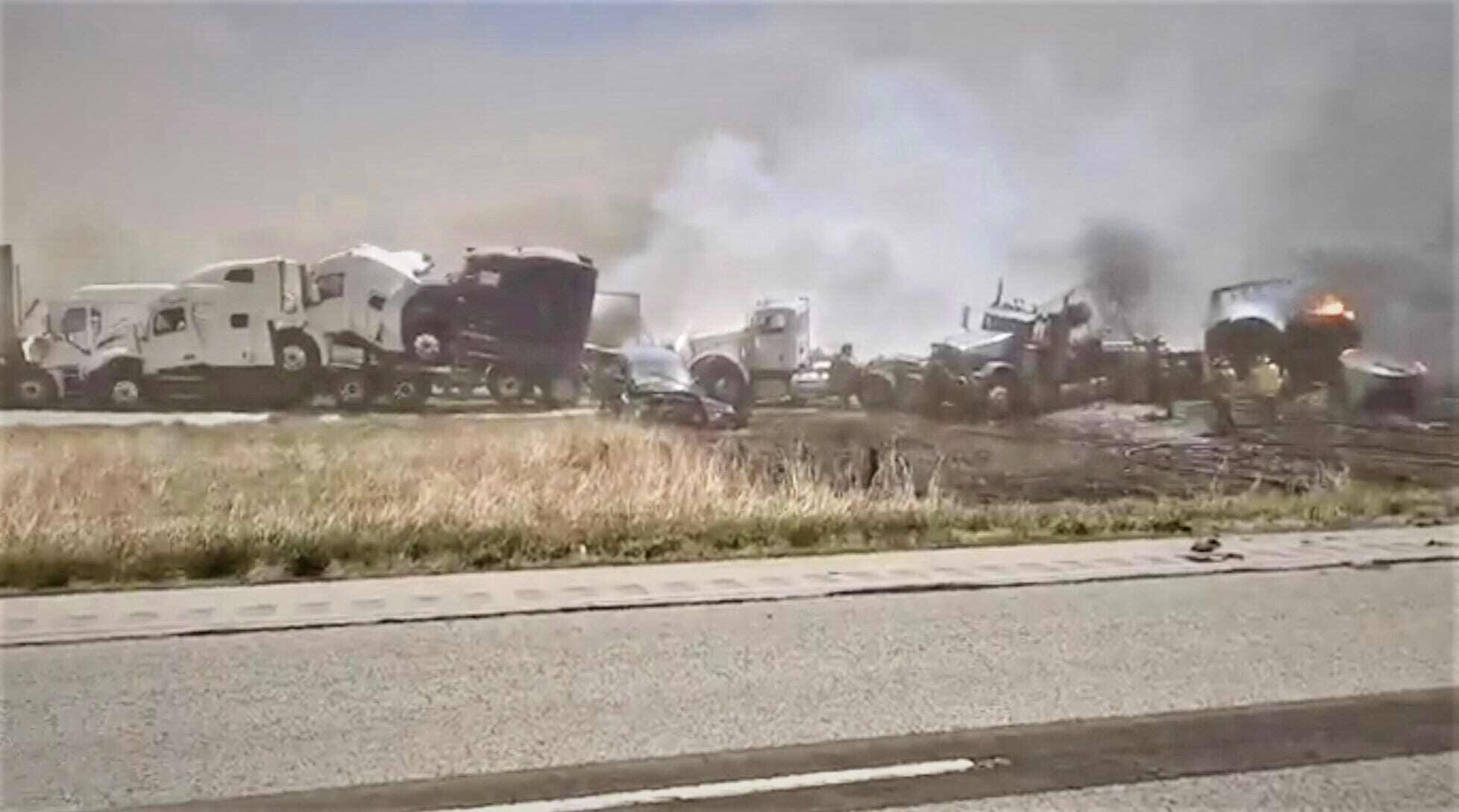 Strong winds whipped up newly plowed fields off I-55 in Illinois, according to the National Weather Service, causing a massive vehicle pileup.