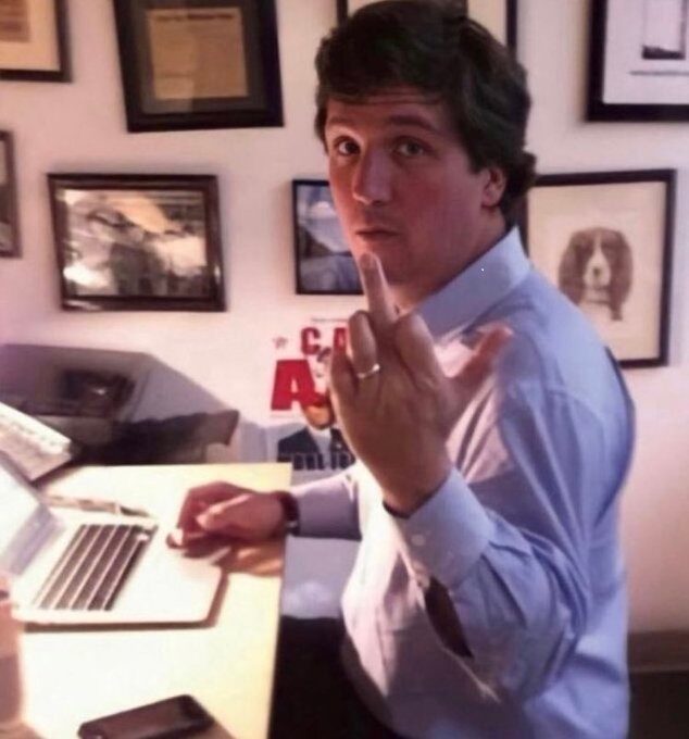 Click to enlarge tucker carlson middle finger