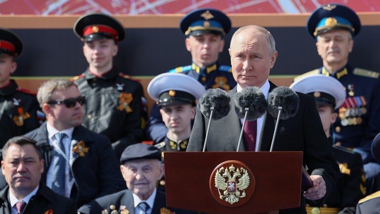 Russian President Vladimir Putin delivers a speech at the Victory Day military parade