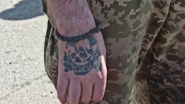 Click to enlarge skull hand tattoo