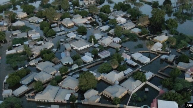 Click to enlarge This aerial view shows floodwater in Beledweyne, central Somalia, on May 12, 2023.