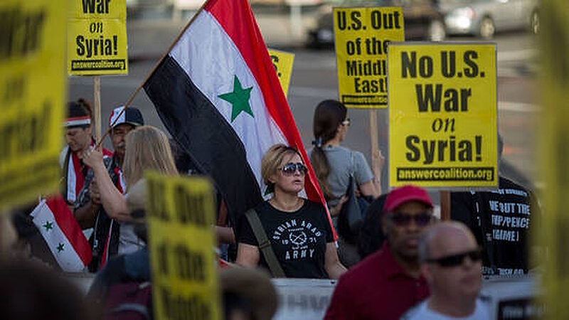 Click to enlarge protests us syria war