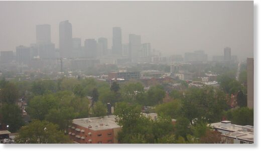 Wildfire smoke covers the Denver skyline on May 19, 2023.