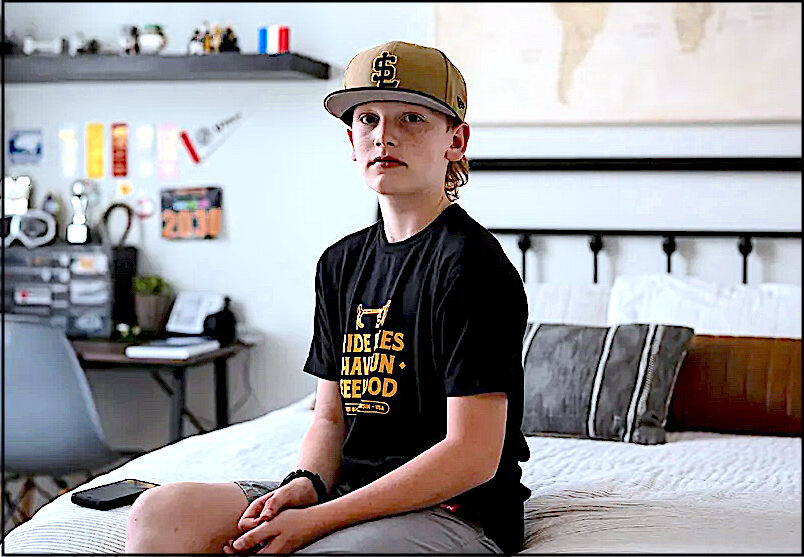 Click to enlarge kid on bed