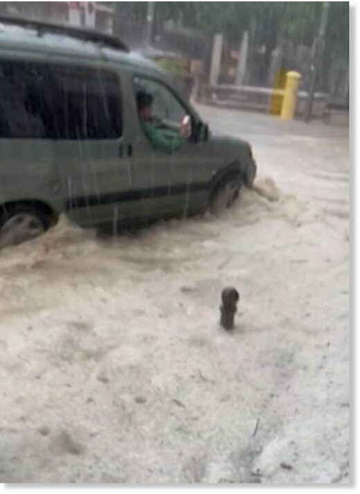 Click to enlarge Motorists were seen trying their luck on the waterlogged roads. Many were no match for the walls of water