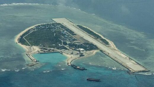 Click to enlarge An aerial view shows the Philippine-occupied Thitu Island