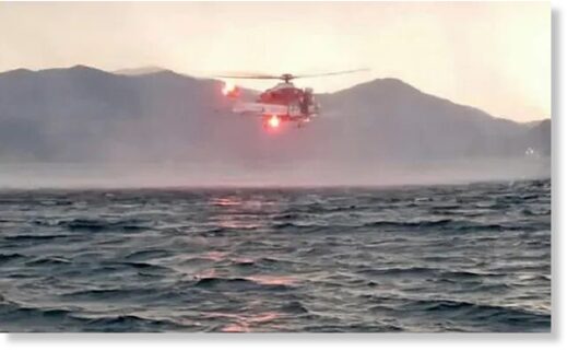 A search helicopter over Lake Maggiore.
