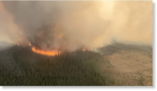 The East side of the Paskwa fire burns in the High Level Forest Area district of Alberta in a May 9, 2023, handout photo.