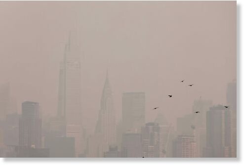 The Manhattan skyline is seen covered in haze and smoke caused by a wildfire in Canada, June 7, 2023.