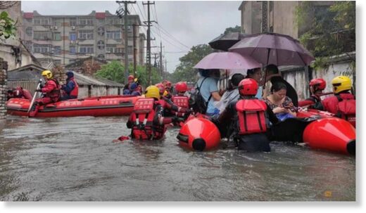 Click to enlarge Rescue workers evacuate stranded residents on a flooded street following heavy rainfall in Beihai, Guangxi Zhuang Autonomous Region, China, Jun 8, 2023.
