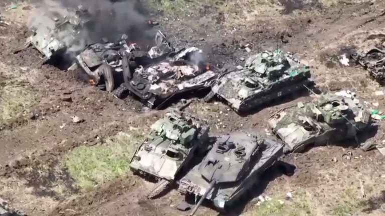 Click to enlarge A Ukrainian Leopard 2 tank and several Bradley fighting vehicles destroyed by the Russian forces in Russia’s Zaporozhye Region.