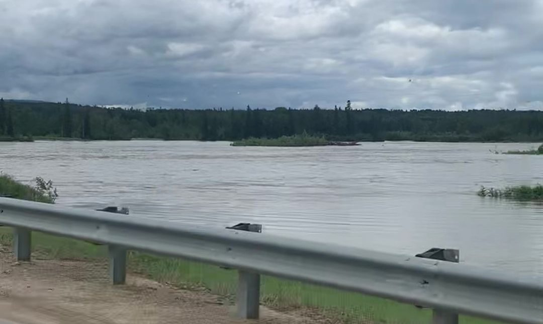 The Athabasca River overflowed its banks in Woodlands County and flooded the surrounding lands near Whitecourt, Alta. on Tuesday, June 20, 2023.