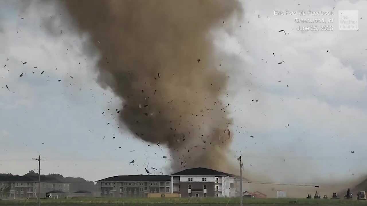 In a shocking, terrifying display, a powerful tornado shreds homes and other buildings as it moved through Greenwood, Indiana.