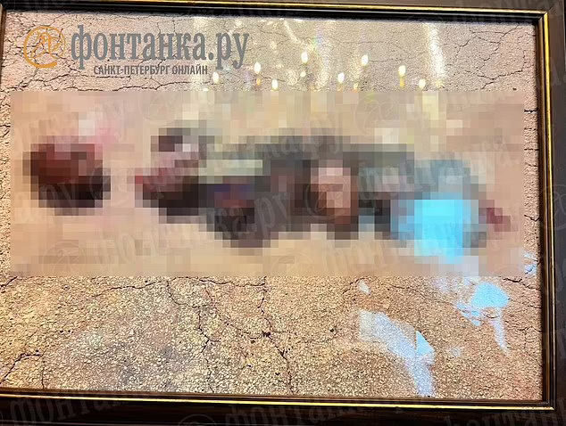 Click to enlarge A framed photo which is purported to show the severed heads of exiled private military leader Prigozhin's enemies