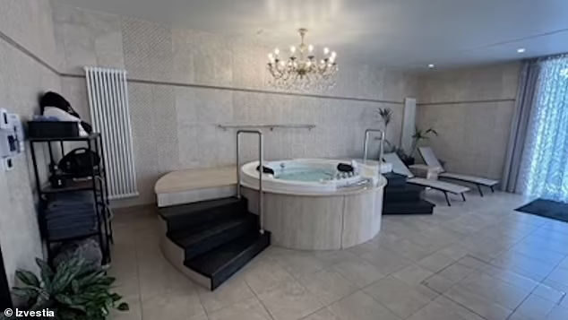 Click to enlarge A photograph published in Izvestia shows a spa and sauna room, lit by a chandelier