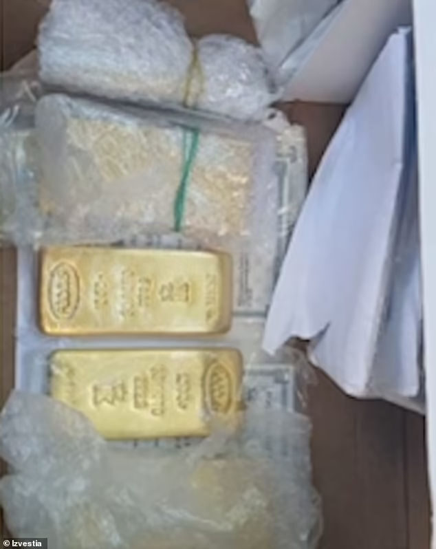 Click to enlarge Gold bars were among the riches found by police in Prigozhin's mansion