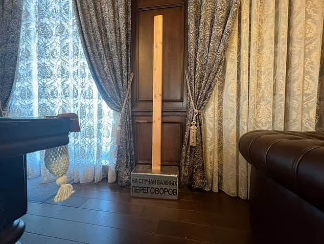Click to enlarge A giant sledgehammer with the inscription 'For use in important negotiations' was photographed on display near a snooker table in a reception room of the mansion