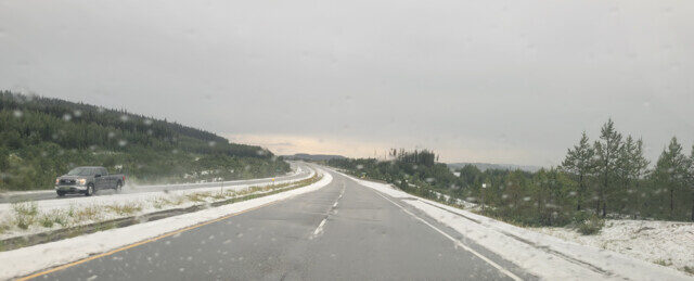 Snow fell near Pennask Summit of the Okanagan Connector Wednesday afternoon.