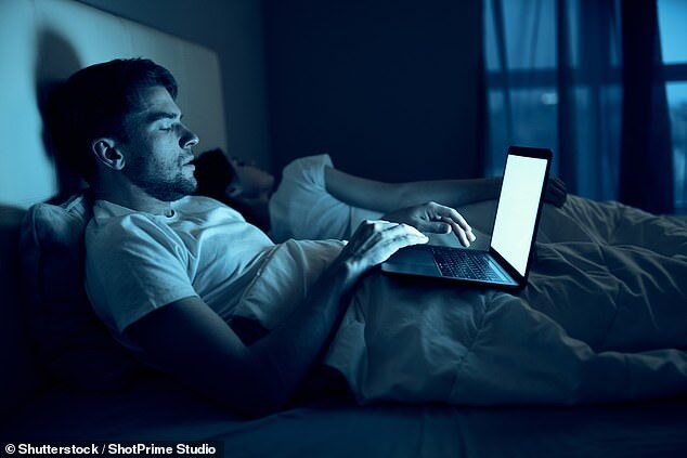 man using laptop