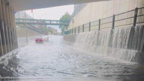 Water pools in a Cote Saint-Luc, Que. underpass as heavy rains pelt large portions of Southern Quebec and Ontario on Thursday, July 13, 2023.