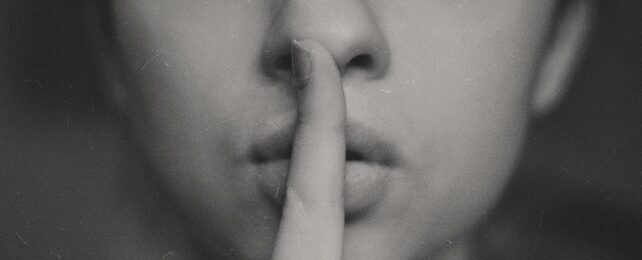silence shhhhh finger over mouth