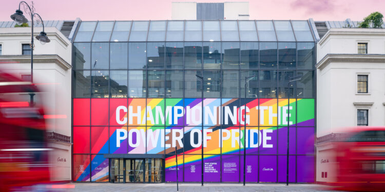 Click to enlarge pride banner on building