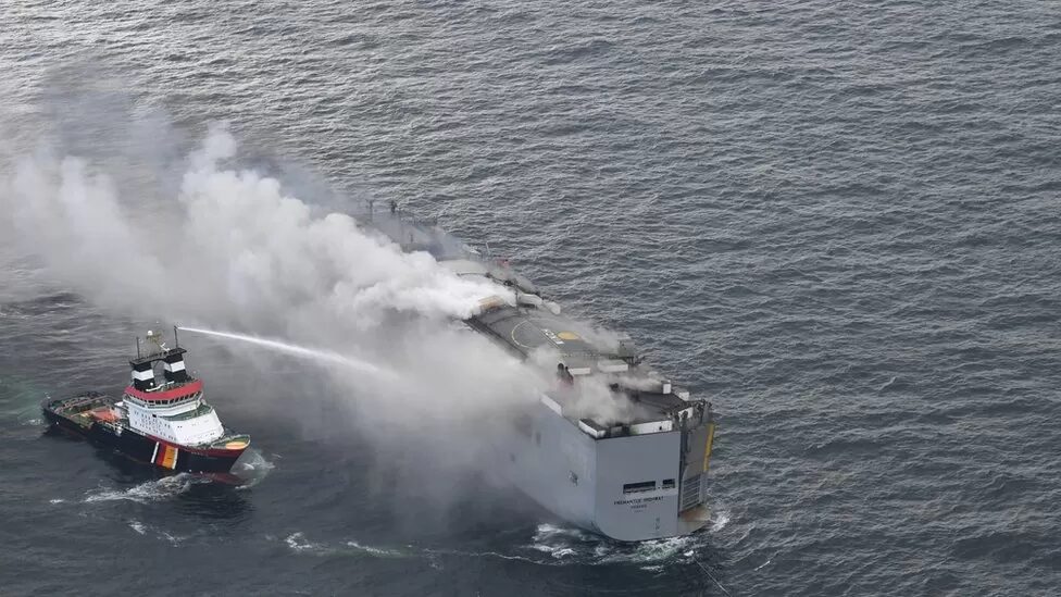 Click to enlarge The ship was being doused on both sides to cool it down