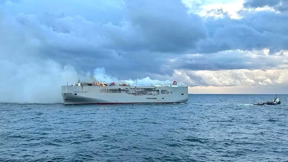 Click to enlarge By morning the cargo ship was still on fire and Dutch authorities were trying to limit damage to the environment