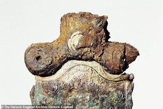 sword hilt iron age grave