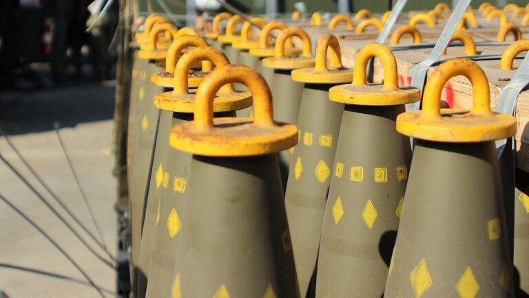 Click to enlarge US-made 155mm cluster munitions