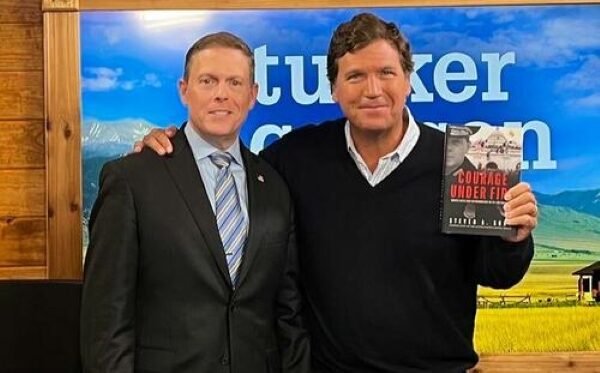 Click to enlarge Police Chief Steven Sund and Tucker Carlson