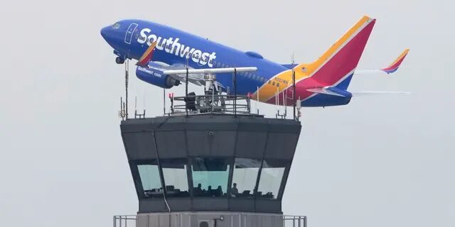 Click to enlarge A Southwest Airlines jet takes off from Midway Airport in Chicago