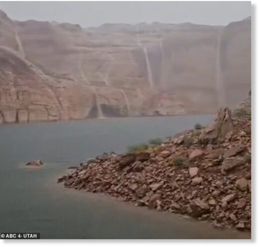 Waterfalls formed following severe storms on August 2 at Lake Powell, creating a spectacle for onlookers