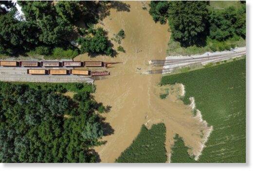 This aerial photo taken on Aug. 8, 2023 shows flooded railroads and sunken freight trains after heavy rainfall near Koprivnica, Croatia.