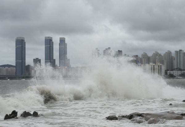 High waves crash a shore as the Tropical Storm Khanun approaches to the Korean Peninsular, in Busan, on Aug. 10.
