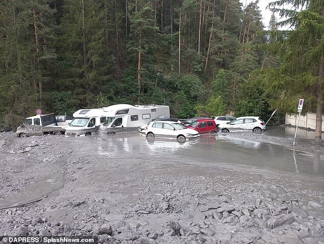 Cars and campervans were damaged in the mudslide in Bardonecchia on Sunday