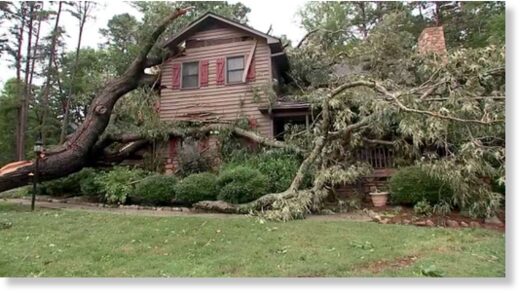 Click to enlarge A tree fell onto a house in Hillsborough, N.C., after severe storms hit the region, Aug. 15, 2023.