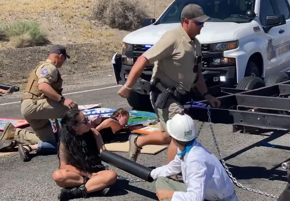 climate protest arrests burning man nevada
